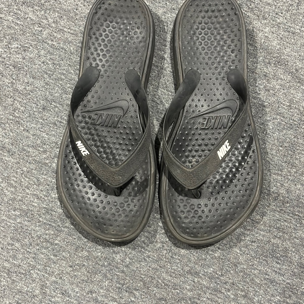 Black Nike sandals, size 9